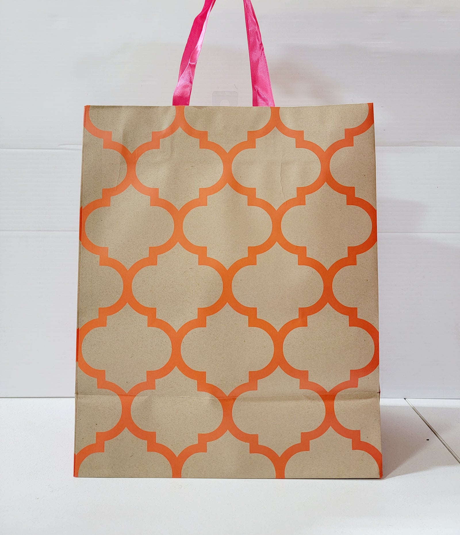 Quatrefoil Large Square Gift Bag by Rosedale (Orange Print and Pink Handle)